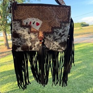 Artisan Leather Crossbody Bag with Fringe